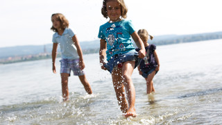 Playing children in the water at Lake Constance