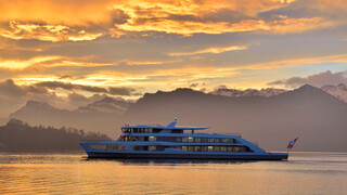 Motor vessel «Diamant» at sunrise on Lake Lucerne. | © perretfoto.ch
